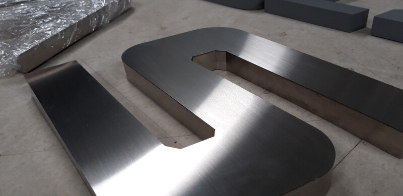 Logo inox xước mờ cao cấp.